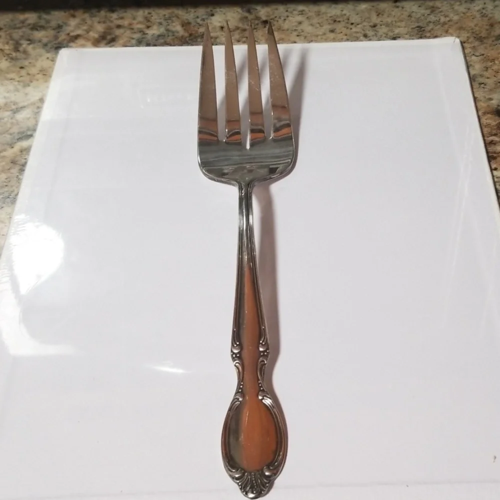 Wm. Roger's 1954 prec mirror meat fork